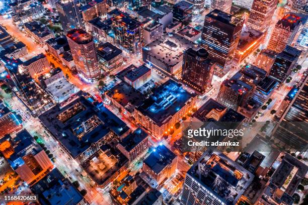 aerial of downtown los angeles california at night - downtown los angeles aerial stock pictures, royalty-free photos & images