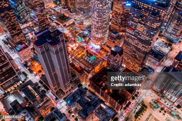 aerial of downtown los angeles california at night - hollywood california stock-fotos und bilder