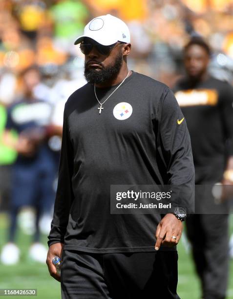 Head coach Mike Tomlin of the Pittsburgh Steelers looks on during warmups before the game against the Seattle Seahawks at Heinz Field on September...