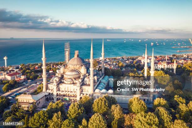 sunrise drone photo of blue mosque - turkish stock-fotos und bilder