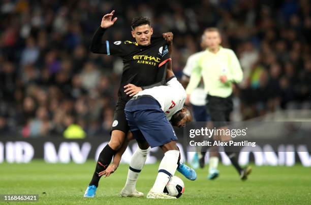 Japhet Tanganga of Spurs is tackled by Nabili Zoubdi Touaizi of Manchester City during the Premier League 2 match between Tottenham Hotspur and...