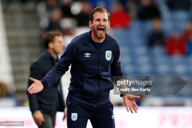 Jan Siewert of Huddersfield Town protests to the linesman during the Sky Bet Championship match between Huddersfield Town and Fulham at John Smith's...