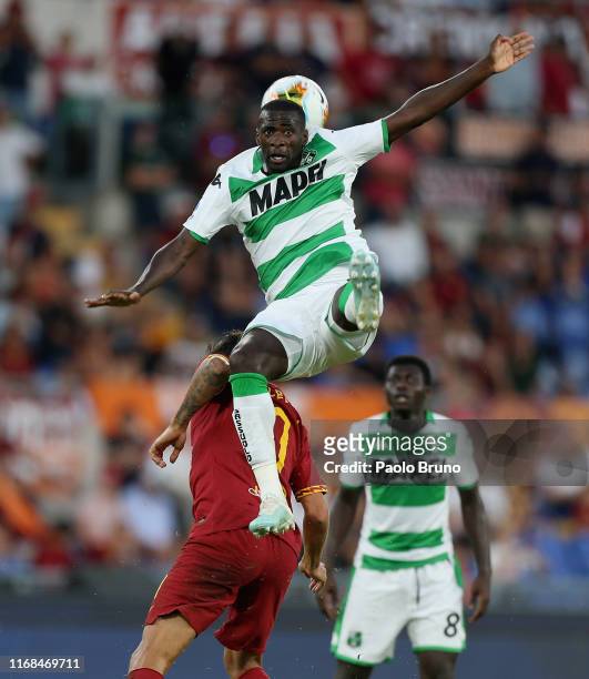 Pedro Obiang of US Sassuolo in action against Lorenzo Pellegrini of AS Roma during the Serie A match between AS Roma and US Sassuolo at Stadio...