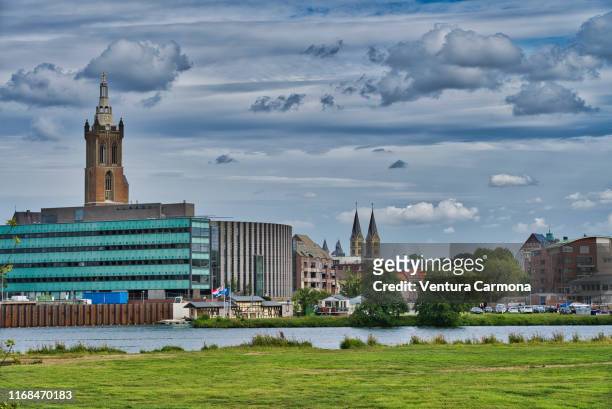 view of roermond across the meuse river - netherlands - limburg netherlands stock pictures, royalty-free photos & images
