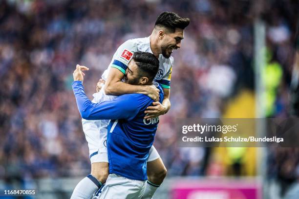 Suat Serdar of Schalke celebrates his goal with Ozan Kabak during the Bundesliga match between SC Paderborn 07 and FC Schalke 04 at Benteler Arena on...