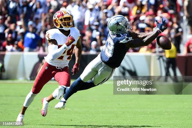 Michael Gallup of the Dallas Cowboys is unable to make a catch in front of Josh Norman of the Washington Redskins during the first half at FedExField...