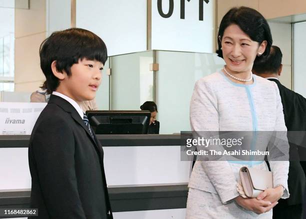 Crown Princess Kiko of Akishino and Prince Hisahito are seen on departure for Bhutan at Haneda Airport on August 16, 2019 in Tokyo, Japan.