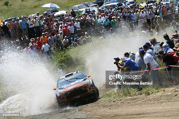 Sebastien Loeb of France and Daniel Elena of Monaco compete in their Citroen Total WRT Citroen DS3 WRC during Day1 of the WRC Rally of Greece on June...