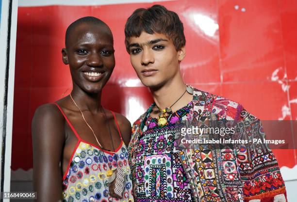 Models backstage during the Ashish Spring/Summer 2020 London Fashion Week show outside the Seymour Hall in London.