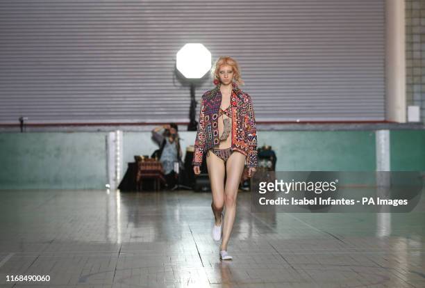 Models on the catwalk during the Ashish Spring/Summer 2020 London Fashion Week show outside the Seymour Hall in London.