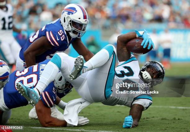 Cameron Artis-Payne of the Carolina Panthers runs the ball against the Buffalo Bills in the first quarter during the preseason game at Bank of...