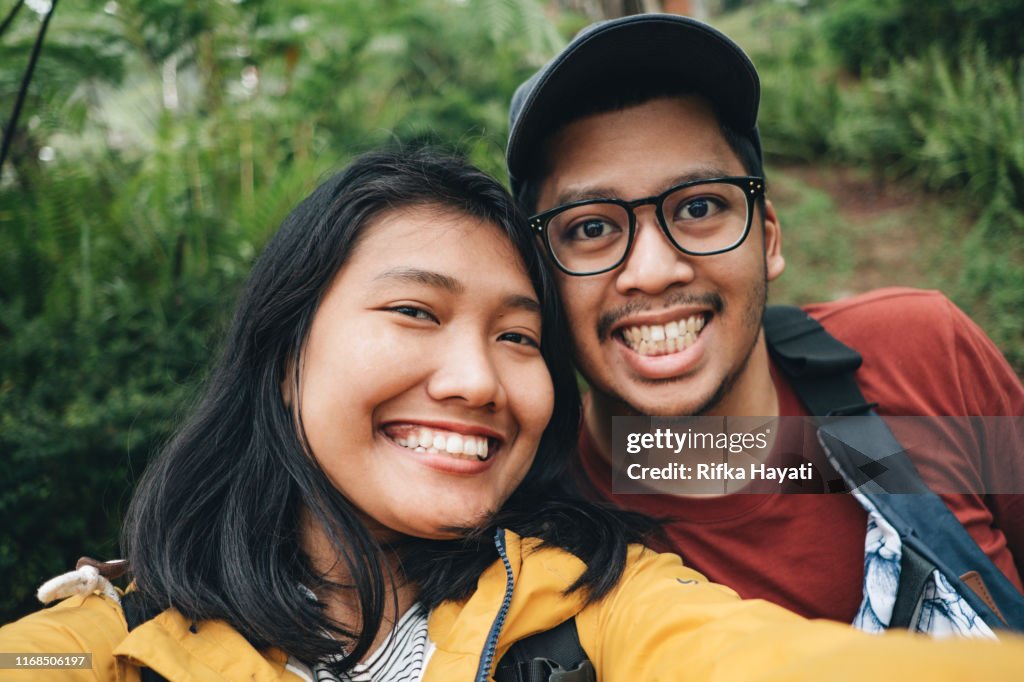 Young Couple Selfie Together while Travelling in Bandung