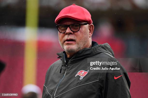 Head coach Bruce Arians of the Tampa Bay Buccaneers looks on during warm-ups before a preseason football game against the Miami Dolphins at Raymond...