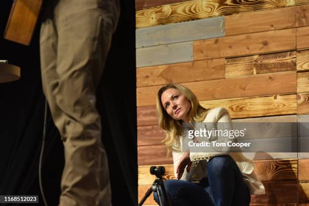 Singer-songwriter Jewel with her dad Atz Kilcher on stage during the first day of the Wellness Your Way Festival at the Colorado Convention Center on...