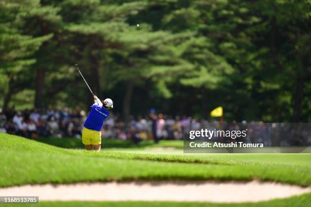 Ritsuko Ryu of Japan hits her second shot on the 5th hole during the second round of Karuizawa 72 Golf Tournament at Karuizawa 72 Golf North Course...