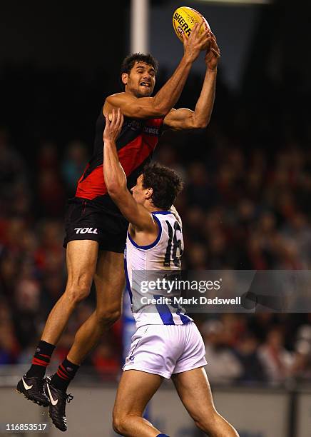 Patrick Ryder of the Bombers flies for a mark during the round 13 AFL match between the Essendon Bombers and the North Melbourne Kangaroos at Etihad...