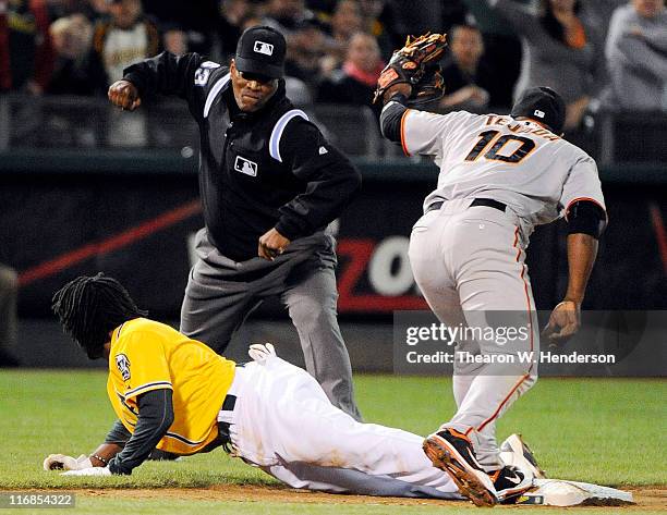 Jemile Weeks of the Oakland Athletics, attempting to stretch a double into a triple, has the tag put on him by Miguel Tejada of the San Francisco...