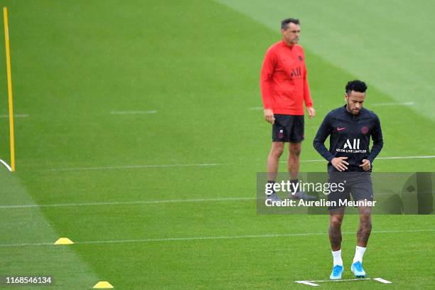 Neymar Jr warms up during a Paris Saint-Germain training session at Centre Ooredoo on August 17, 2019 in Paris, France.