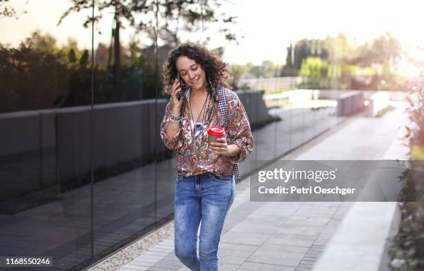 a young woman exploring a new city. - sandton cbd stock pictures, royalty-free photos & images