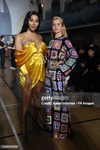 Munroe Bergdorf and Paloma Faith on the front row during the Ashish Spring/Summer 2020 London Fashion Week show outside the Seymour Hall in London.