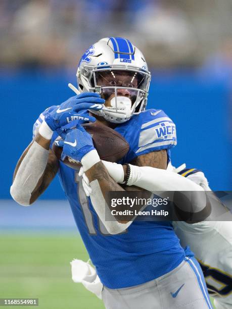 Kenny Golladay of the Detroit Lions celebrates a reception during the fourth quarter of the game against the Los Angeles Chargers at Ford Field on...