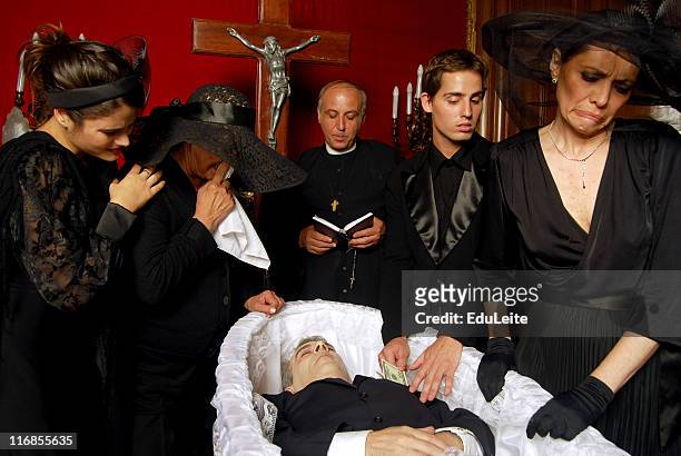 stealing the dead - family funeral stock pictures, royalty-free photos & images