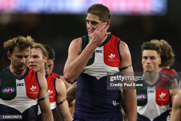 Aaron Sandilands of the Dockers walks to the rooms at the half time break during the round 22 AFL match between the Fremantle Dockers and the...