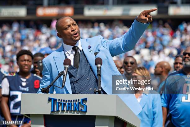 Eddie George of the Tennessee Titans speaks during the halftime presentation to retire his number during a game against the Indianapolis Colts at...