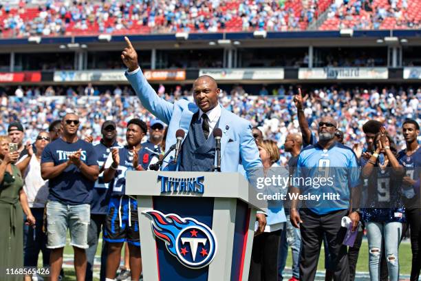 Eddie George of the Tennessee Titans speaks during the halftime presentation to retire his number during a game against the Indianapolis Colts at...