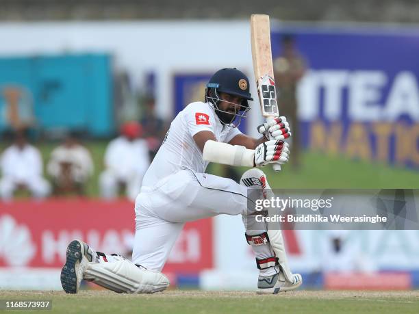 Lahiru Thirimanne of Sri Lanka hits out during day four of the First Test match between Sri Lanka and New Zealand at Galle International Stadium on...