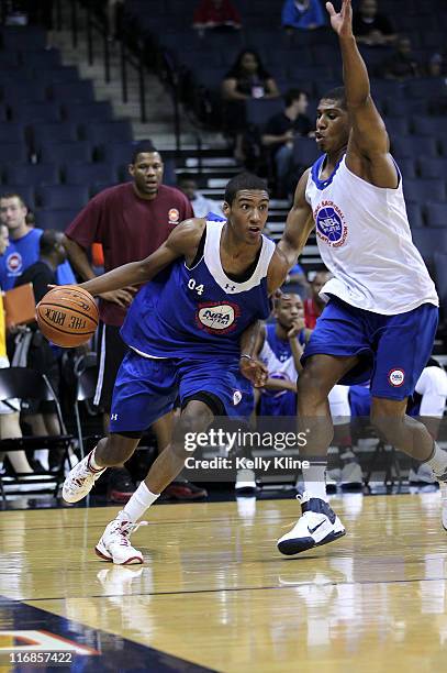 Cameron Biedscheid drives baseline under pressure during the NBPA top 100 Camp on June 17, 2011 at the University of Virginia in Charlottesville,...