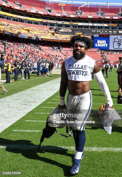 Dallas Cowboys running back Ezekiel Elliott walks off the field following the game against the Washington Redskins on September 15 at FedEx Field in...