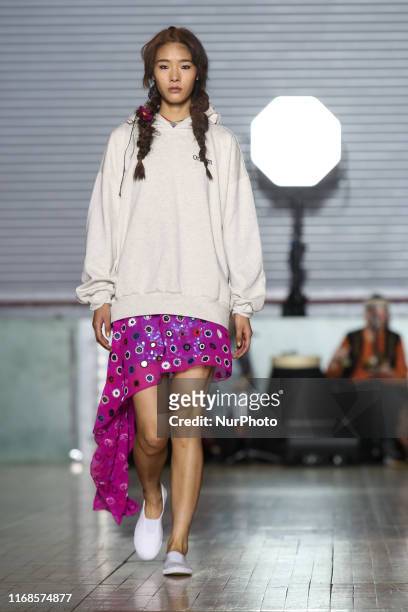 Model walks the runway during Ashish Spring/Summer 2020 collection show during London Fashion Weak in the British Fashion Council show space in...