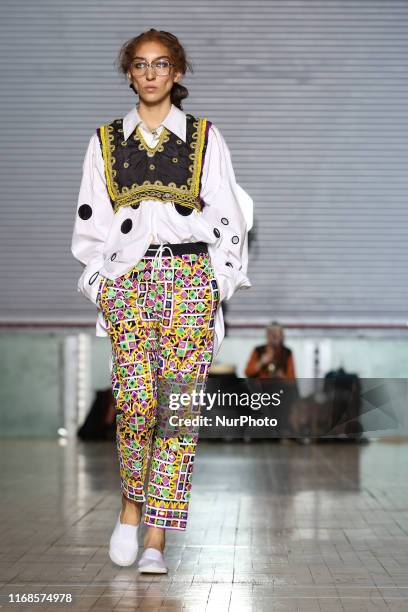 Model walks the runway during Ashish Spring/Summer 2020 collection show during London Fashion Weak in Seymour Hall in London, England on the...