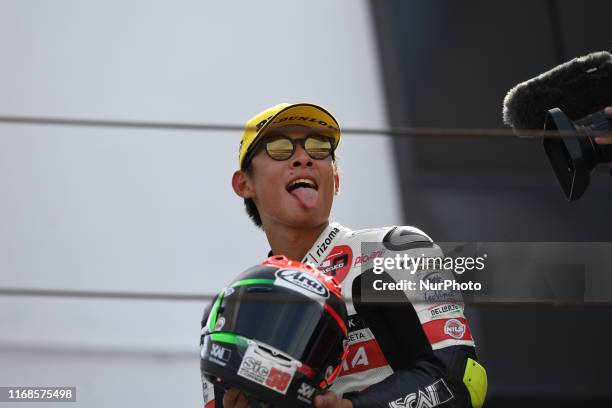 Japanese rider Tatsuki Suzuki of SIC58 Squadra Corse on podium of Octo San Marino and Riviera di Rimini GP, 13th stage of MotoGP World Championship...