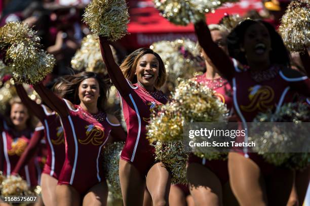 Washington Redskins cheerleaders take the field before the game against the Dallas Cowboys at FedExField on September 15, 2019 in Landover, Maryland.