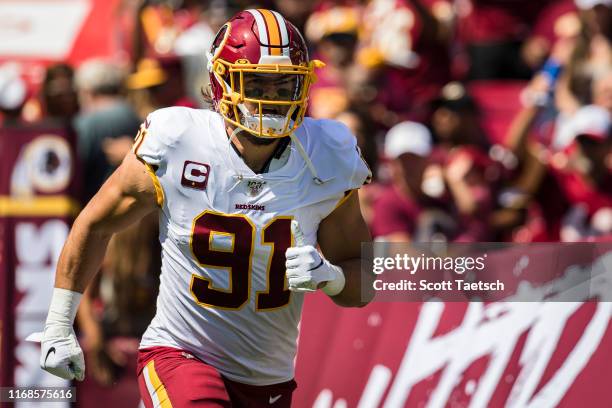 Ryan Kerrigan of the Washington Redskins takes the field before the game against the Dallas Cowboys at FedExField on September 15, 2019 in Landover,...