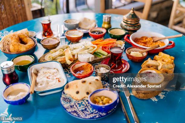 variety of dishes served during traditional turkish breakfast, istanbul, turkey - middle eastern food stock pictures, royalty-free photos & images