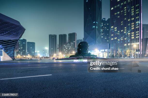 urban streets after rain - street light stock pictures, royalty-free photos & images