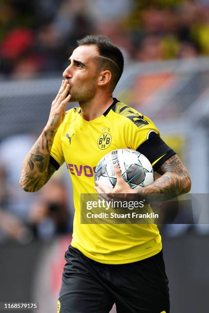 Paco Alcacer of Borussia Dortmund celebrates scoring his sides first goal during the Bundesliga match between Borussia Dortmund and FC Augsburg at...