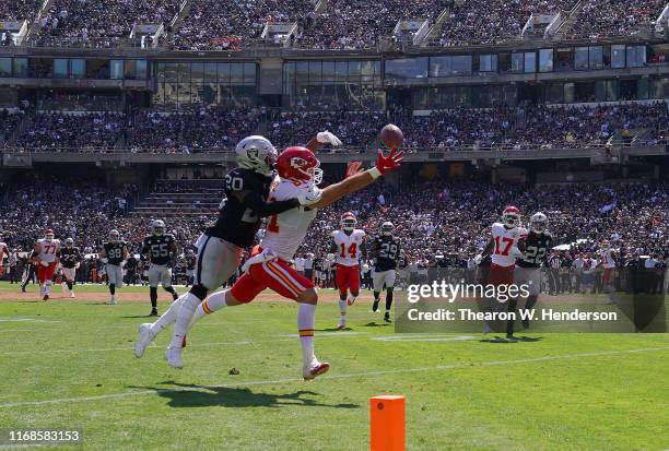 Daryl Worley of the Oakland Raiders breaks up the pass intended for Blake Bell of the Kansas City Chiefs during the second quarter of an NFL football...