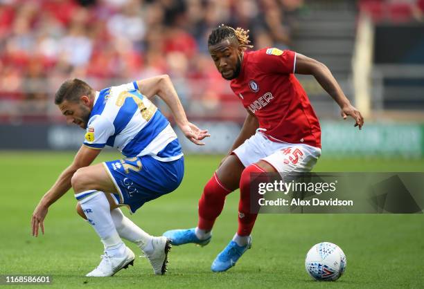 Angel Rangel of Queens Park Rangers competes with Kasey Palmer of Bristol City during the Sky Bet Championship match between Bristol City and Queens...