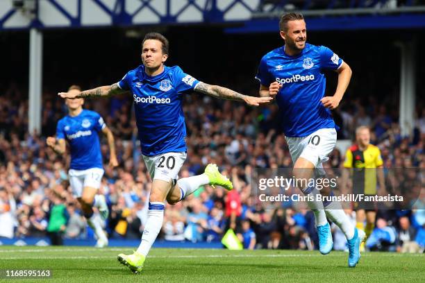 Bernard of Everton celebrates scoring the opening goal during the Premier League match between Everton FC and Watford FC at Goodison Park on August...