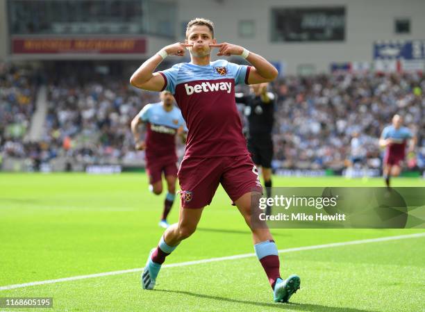 Javier Hernandez of West Ham United celebrates after scoring his team's first goal during the Premier League match between Brighton & Hove Albion and...