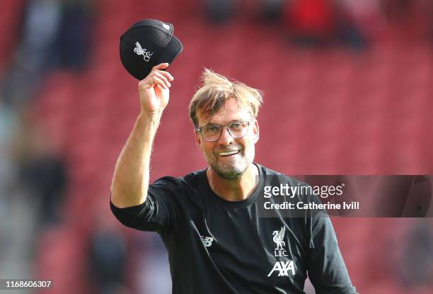 Jurgen Klopp, Manager of Liverpool acknowledges the fans following his teams victory in the Premier League match between Southampton FC and Liverpool...