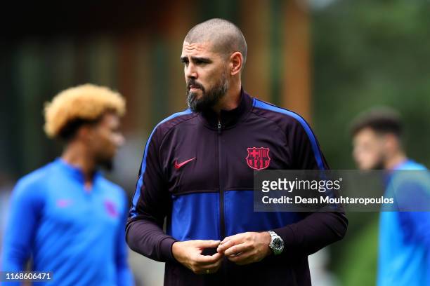 Victor Valdes, Manager / Head Coach of U19 FC Barcelona gives his players instructions from the sidelines during The Otten Cup match between PSV...