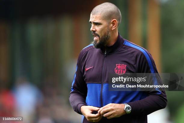 Victor Valdes, Manager / Head Coach of U19 FC Barcelona gives his players instructions from the sidelines during The Otten Cup match between PSV...