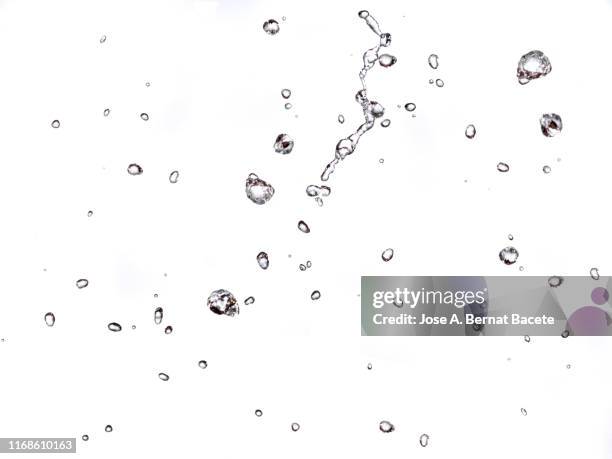 figures and abstract forms of water on a white background. - 水滴　白 ストックフォトと画像