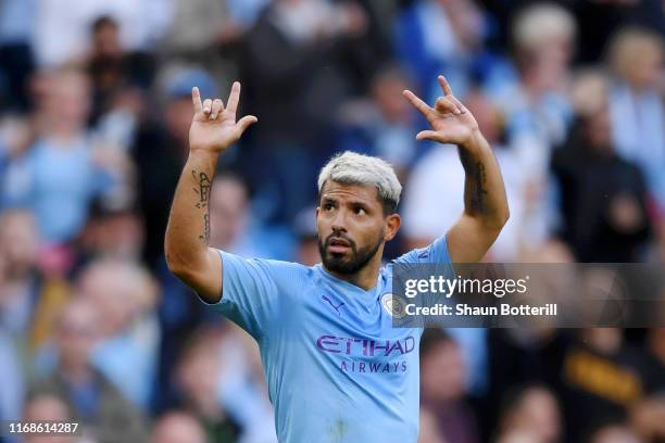 Sergio Aguero of Manchester City celebrates after scoring his team's second goal during the Premier League match between Manchester City and...