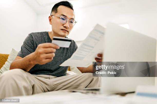 man working at home - bankruptcy law stock pictures, royalty-free photos & images